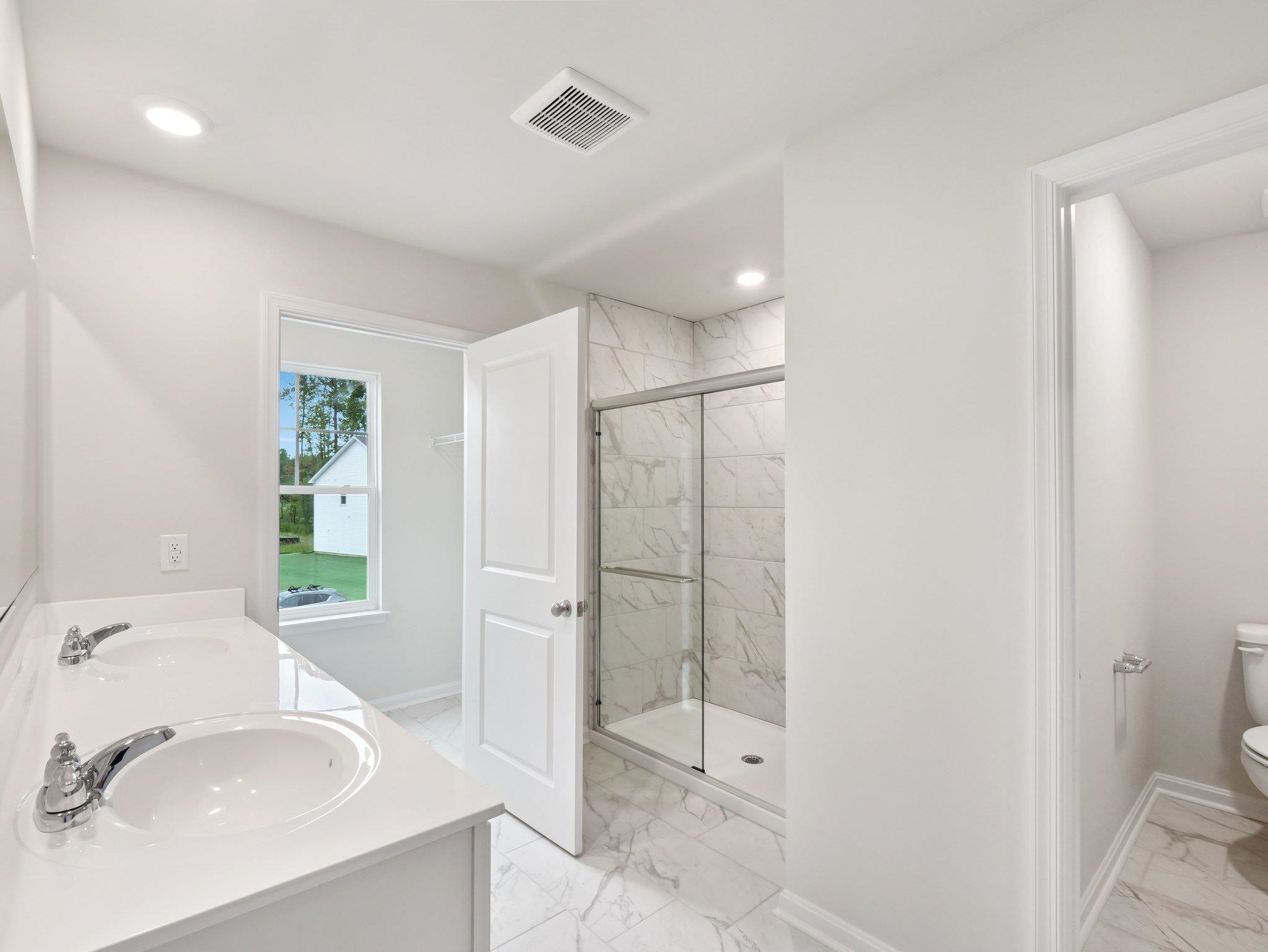 500 Rachel Drive Penn Laird, VA 22846 - Photo 19 of 30 a bathroom with a sink toilet and shower
