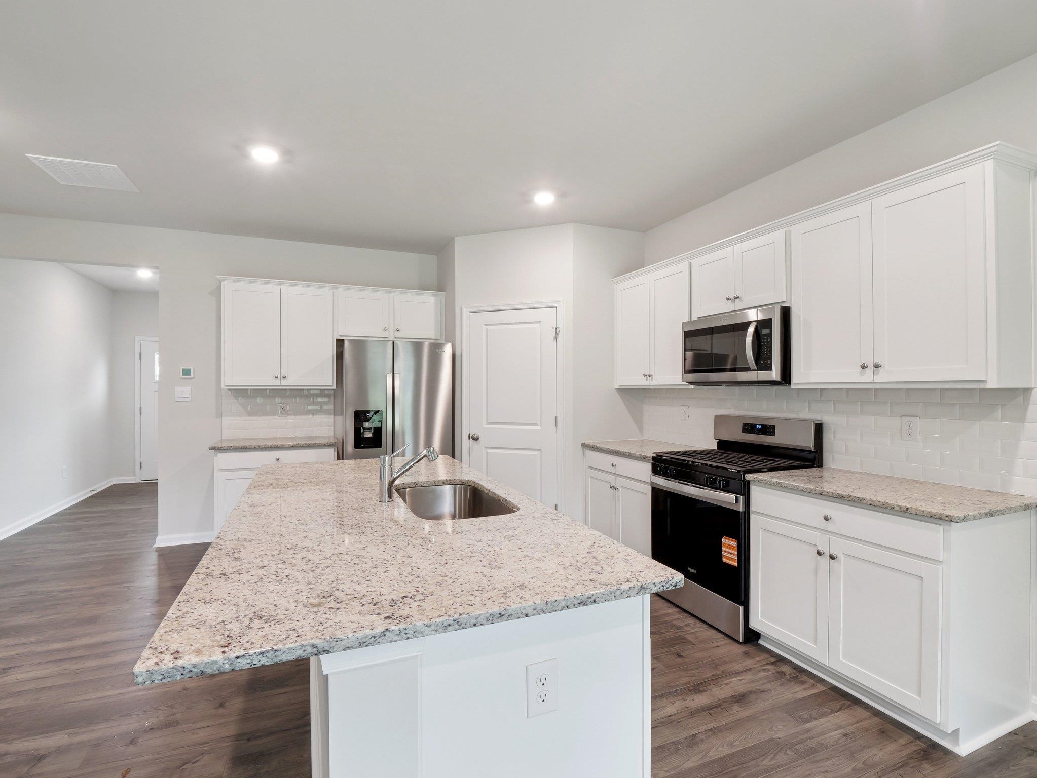 500 Rachel Drive Penn Laird, VA 22846 - Photo 2 of 30 a kitchen with stainless steel appliances granite countertop a sink stove and refrigerator