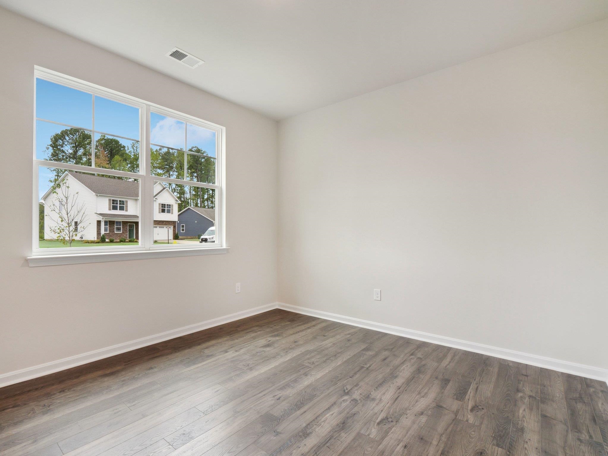 500 Rachel Drive Penn Laird, VA 22846 - Photo 27 of 30 a view of empty room with wooden floor and fan