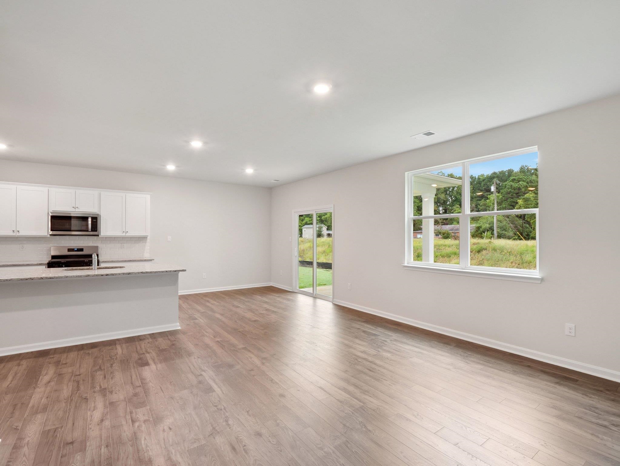 500 Rachel Drive Penn Laird, VA 22846 - Photo 4 of 30 a view of a kitchen with a sink and a stove top oven