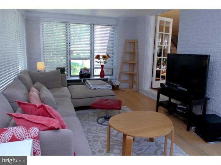 434 Levering Mill Road Merion Station, PA 19066 - Photo 13 of 14 a living room with furniture and a flat screen tv