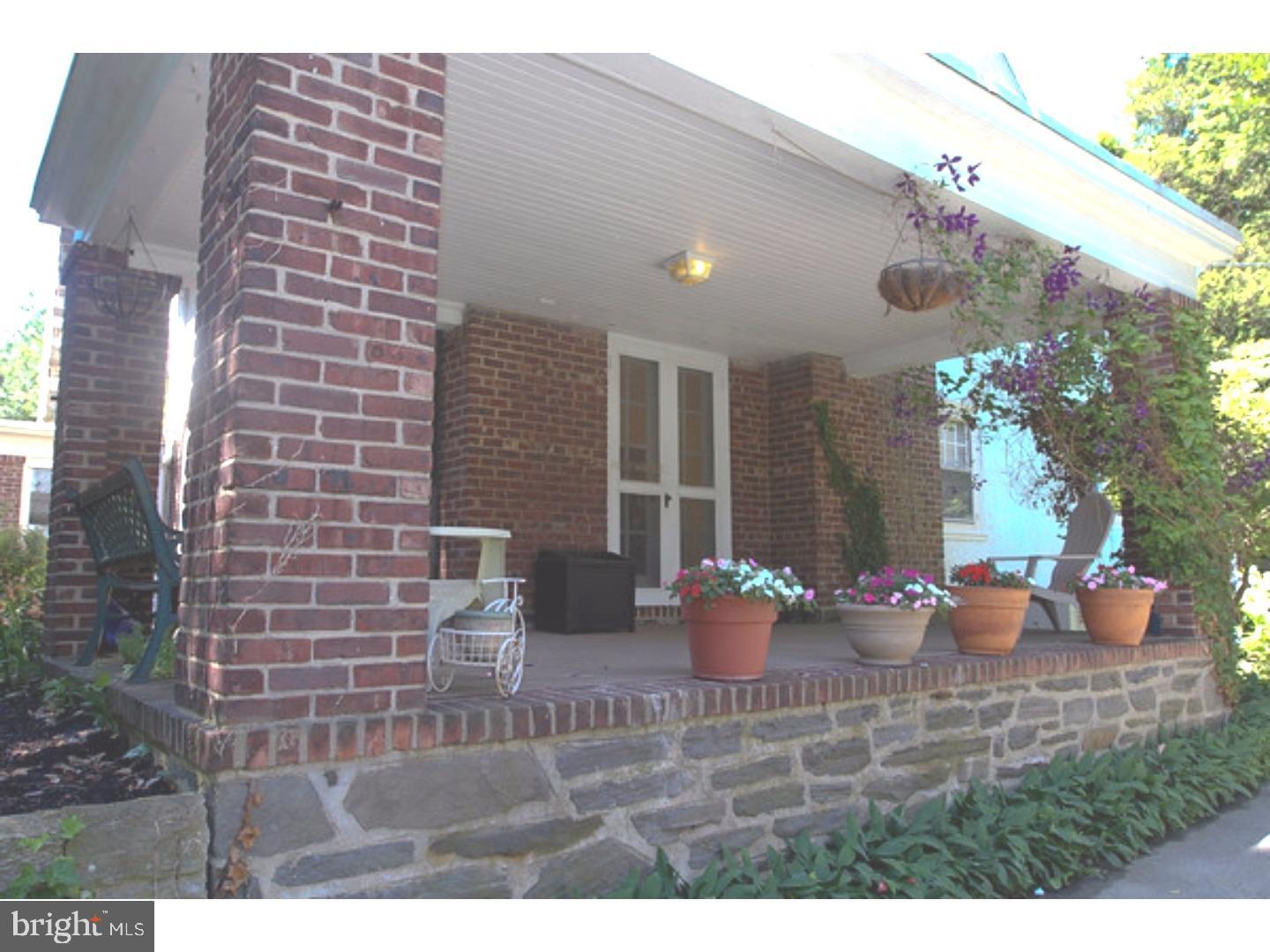 434 Levering Mill Road Merion Station, PA 19066 - Photo 8 of 14 a group of potted plants sitting in front of a building