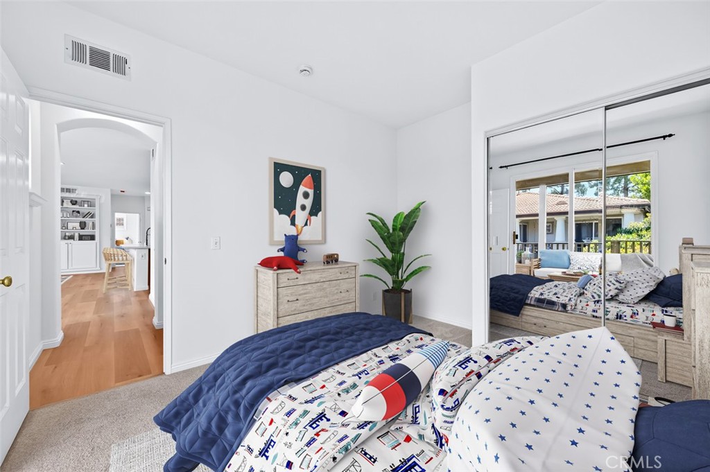 447 Ridgeway Irvine, CA 92620 - Photo 50 of 88 a bedroom with a bed and a potted plant