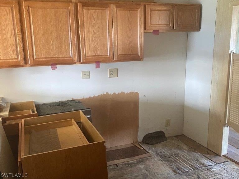 3579 Unique Circle Fort Myers, FL 33908 - Photo 4 of 6 a room with storage and utility