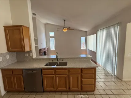 a bathroom with a sink vanity granite and a mirror