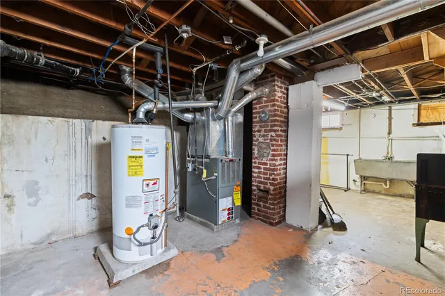 a view of water heater room with gym equipment