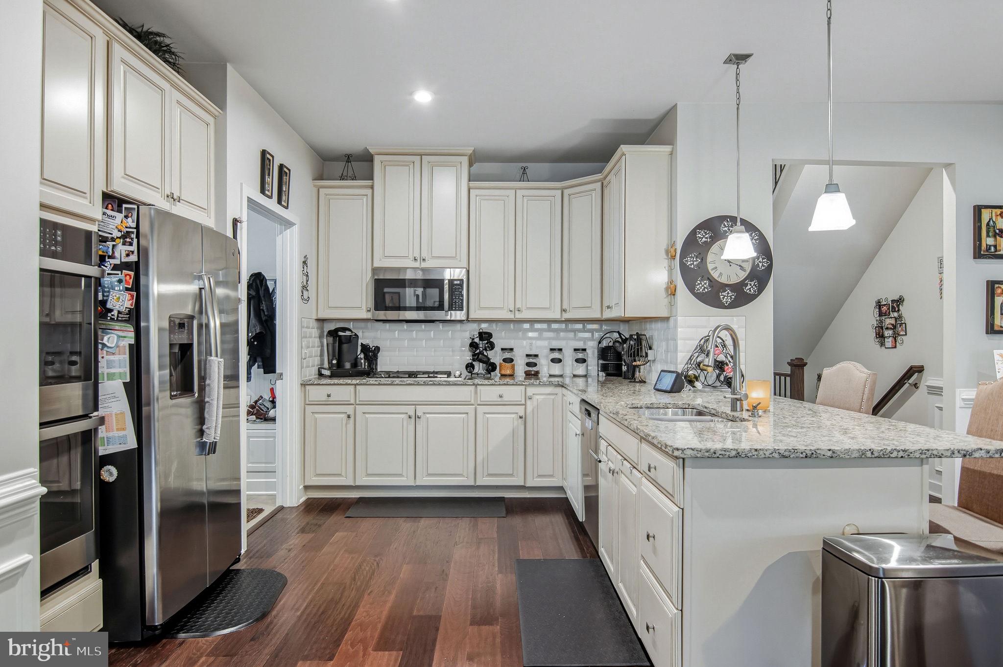 18208 Red Mulberry Road Dumfries, VA 22026 - Photo 7 of 53 Gorgeous Kitchen With Granite and SS Appliances