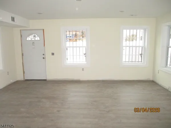 an empty room with windows