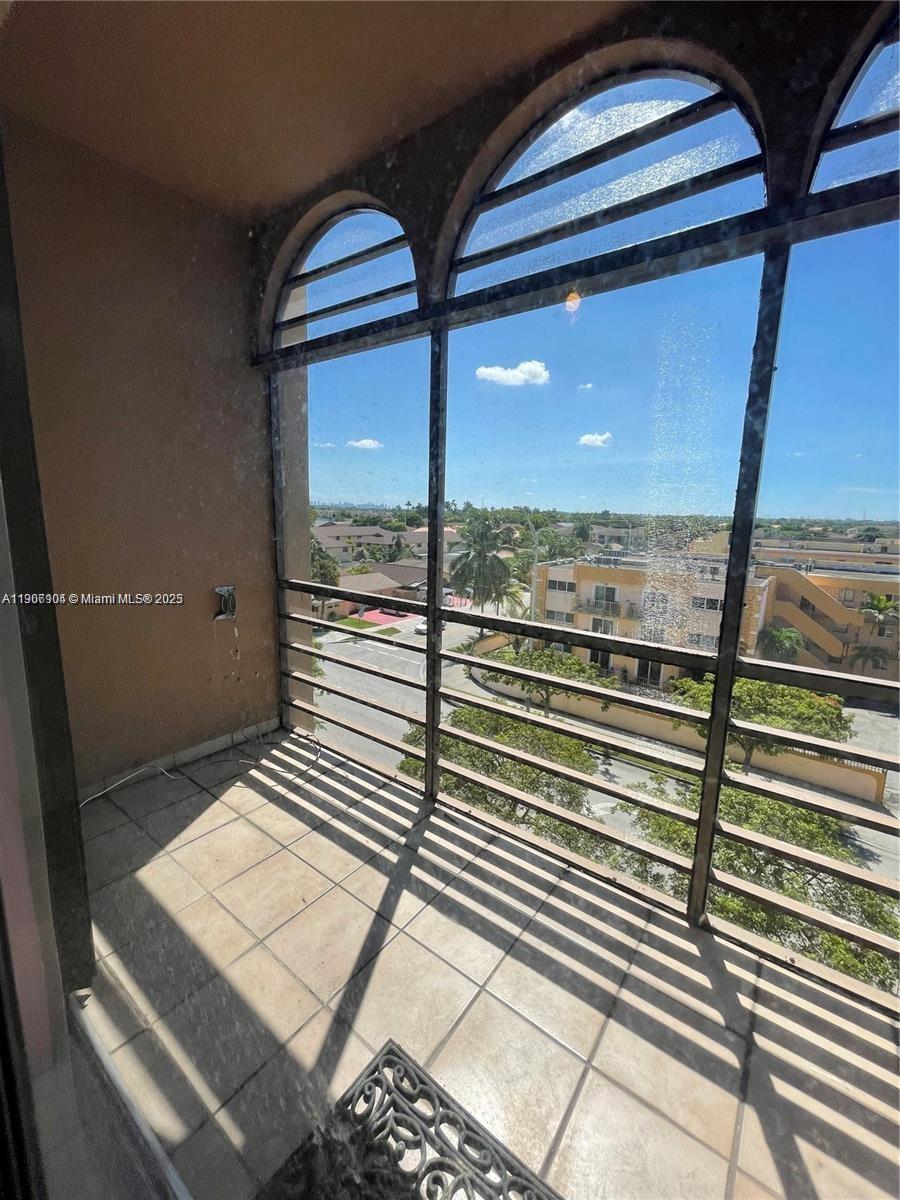 4670 West 13th Lane, Unit 504 Hialeah, FL 33012 - Photo 3 of 16 a view of a balcony