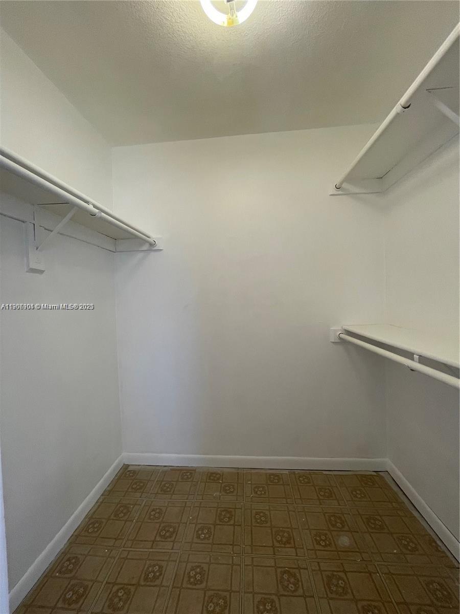 4670 West 13th Lane, Unit 504 Hialeah, FL 33012 - Photo 4 of 16 a view of an empty room