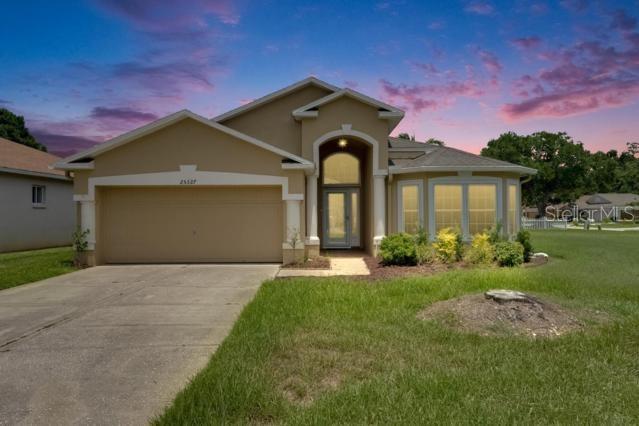 25327 7 Rivers Circle Land O Lakes, FL 34639 - Photo 1 of 1 a front view of a house with a yard