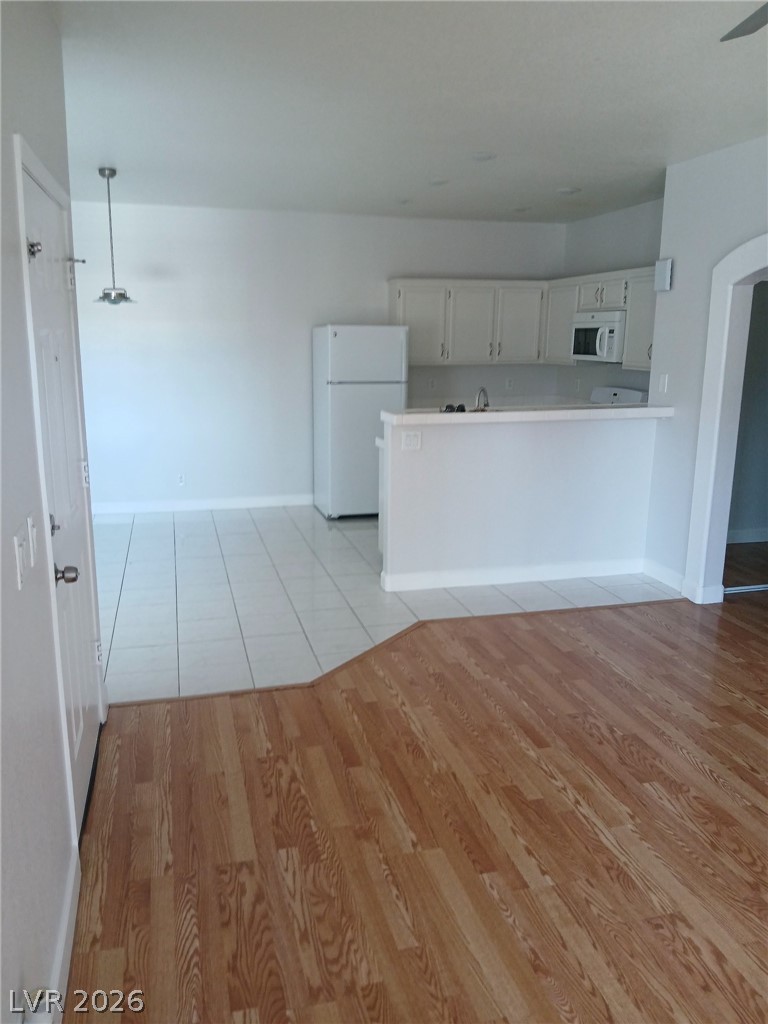 2201 Ramsgate Drive, Unit 426 Henderson, NV 89074 - Photo 2 of 22 This bright kitchen features sleek appliances and ample counter space for culinary endeavors.