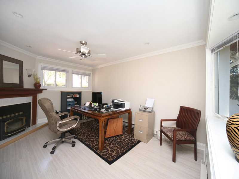 27 Middlesex Road Darien, CT 06820 - Photo 11 of 20 a view of a workspace with furniture and a fireplace