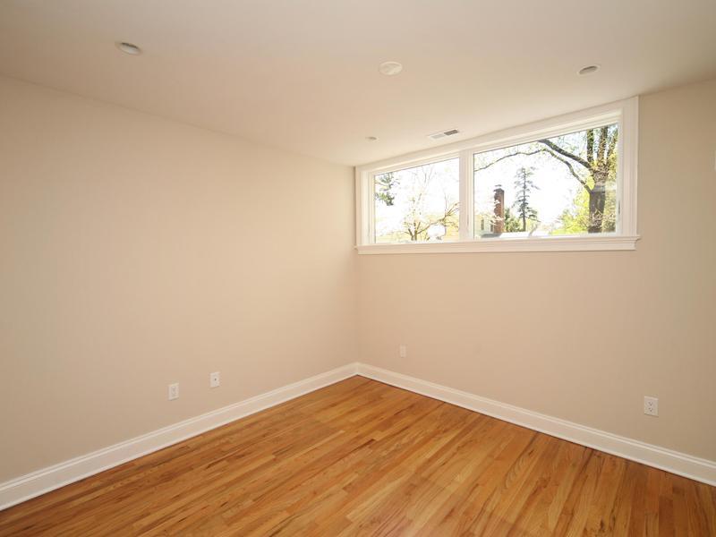 27 Middlesex Road Darien, CT 06820 - Photo 15 of 20 an empty room with wooden floor and window