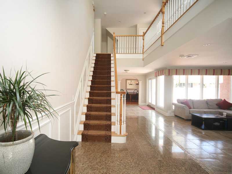 27 Middlesex Road Darien, CT 06820 - Photo 2 of 20 a view of entryway and hall with wooden floor