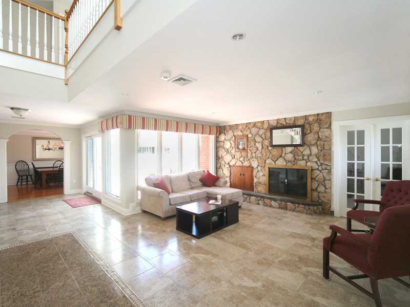 27 Middlesex Road Darien, CT 06820 - Photo 3 of 20 a living room with furniture and a fireplace