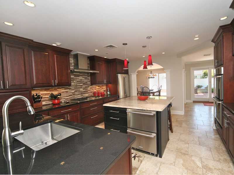 27 Middlesex Road Darien, CT 06820 - Photo 5 of 20 a kitchen with stainless steel appliances granite countertop a sink stove and cabinets