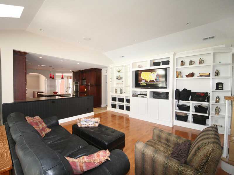 27 Middlesex Road Darien, CT 06820 - Photo 7 of 20 a living room with furniture and a flat screen tv