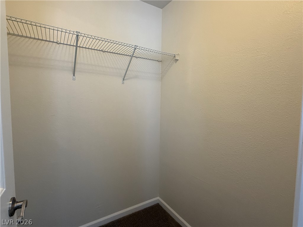 1908 Thunder Ridge Circle Henderson, NV 89012 - Photo 18 of 28 Functional wire shelving provides ample storage in this well-appointed closet.