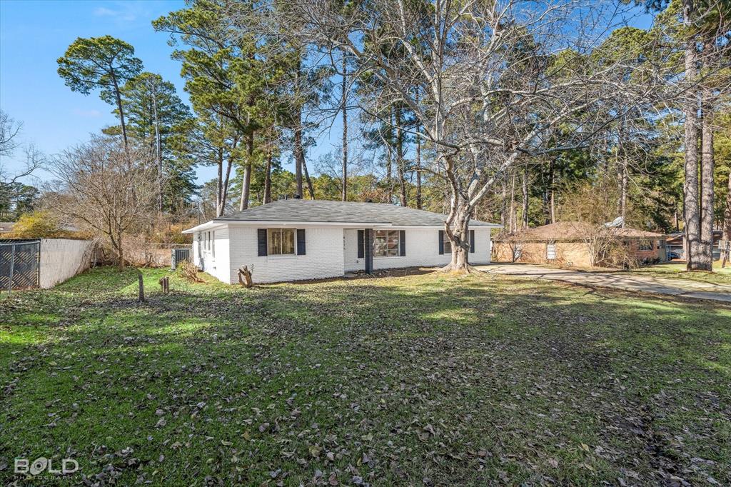 4136 Pines Road Shreveport, LA 71119 - Photo 37 of 38 Back of house featuring brick siding