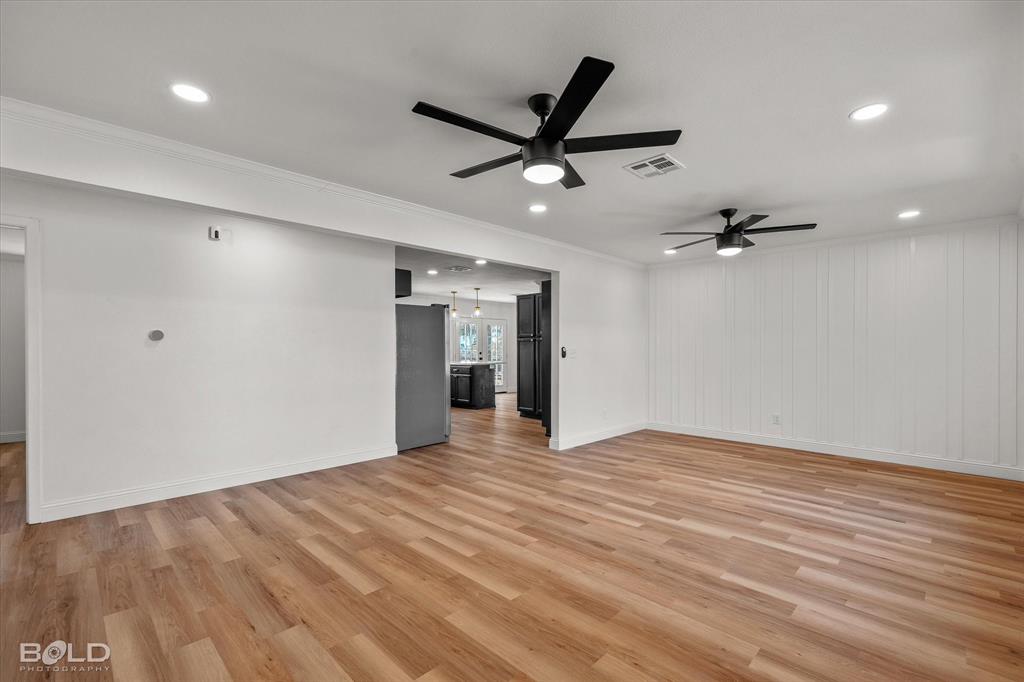4136 Pines Road Shreveport, LA 71119 - Photo 5 of 38 Unfurnished living room featuring light wood-type flooring, recessed lighting, ornamental molding, and a ceiling fan