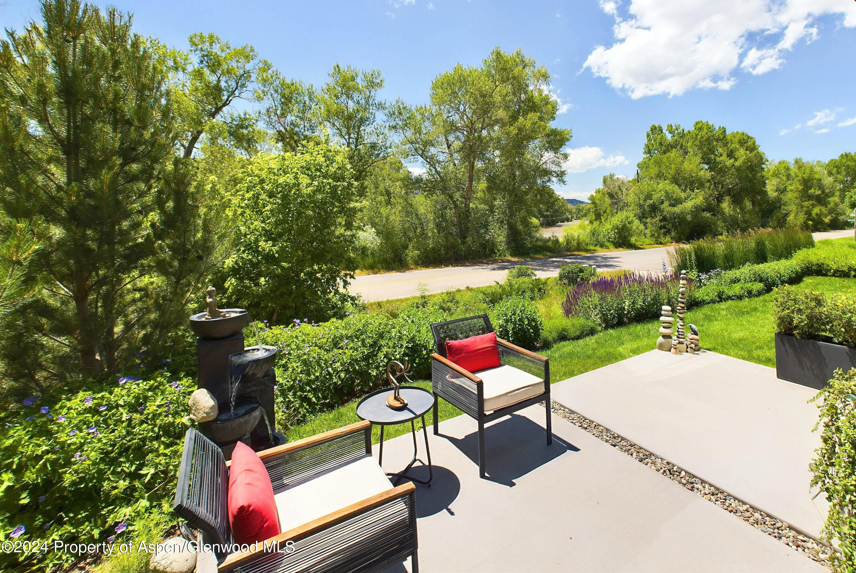 100 Evans Road, Unit 105 Basalt, CO 81621 - Photo 17 of 20 a view of a bench in a backyard