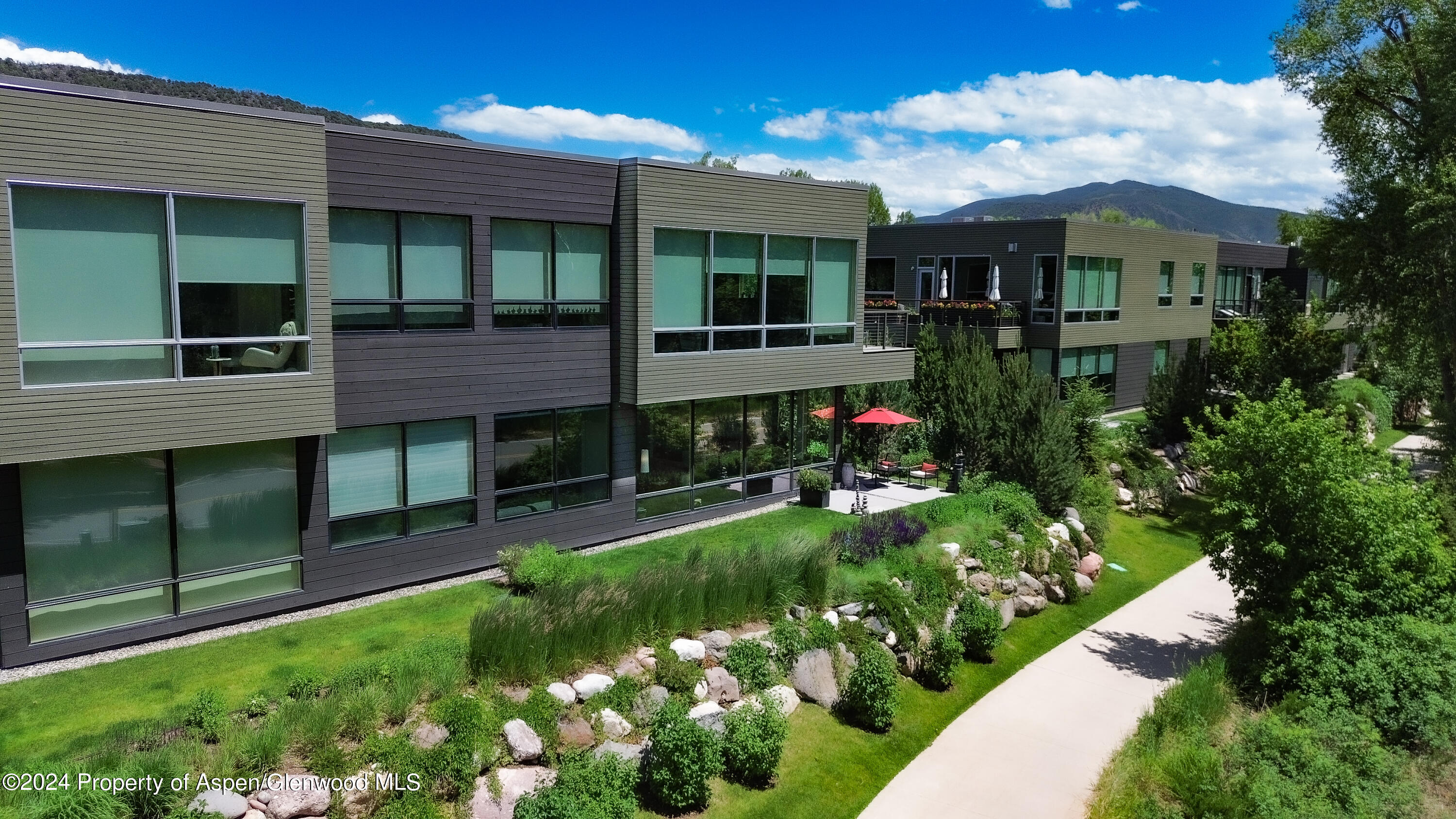 100 Evans Road, Unit 105 Basalt, CO 81621 - Photo 20 of 20 a view of a house with a garden and pathway