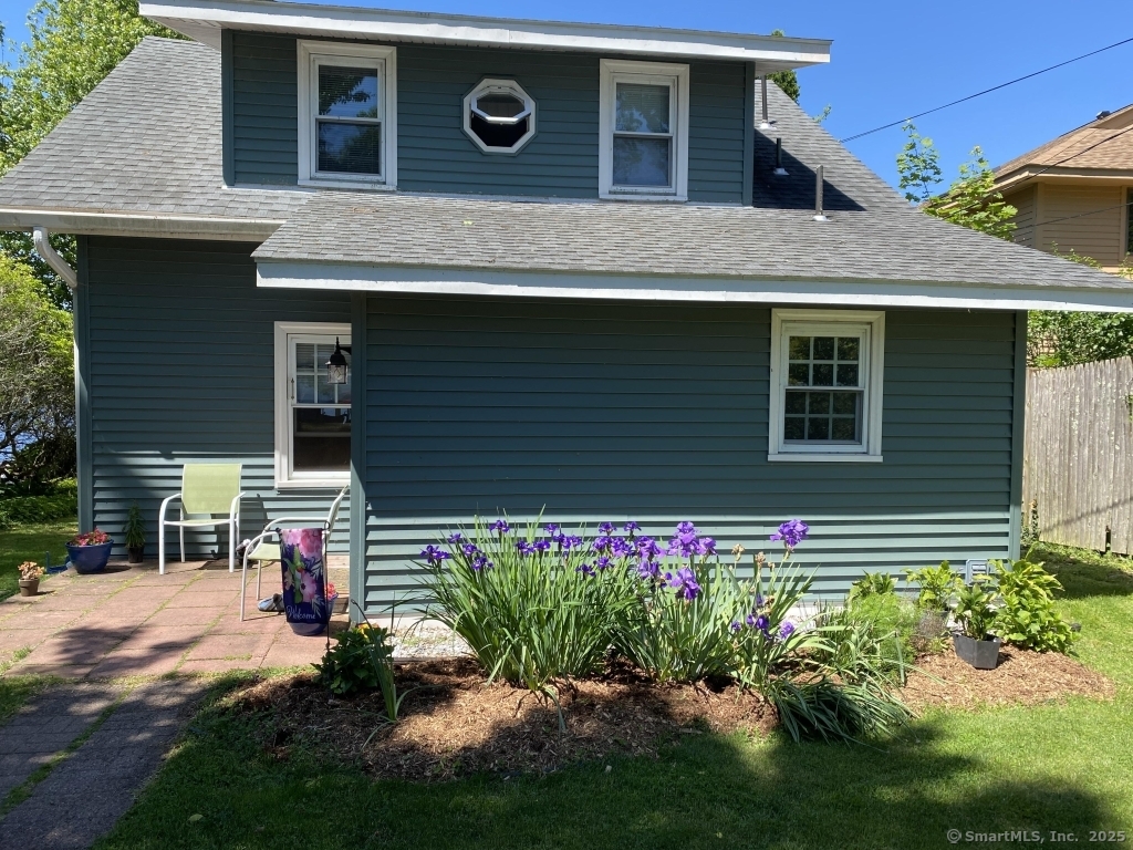 79 Spellman Point Road East Hampton, CT 06424 - Photo 1 of 1 a front view of a house with a yard