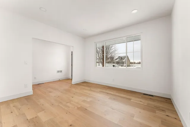 an empty room with windows