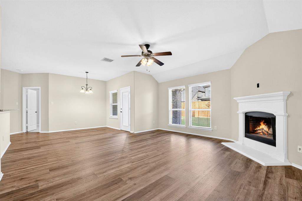 217 Rugby Lane McKinney, TX 75072 - Photo 25 of 40 a view of a room window and wooden floor