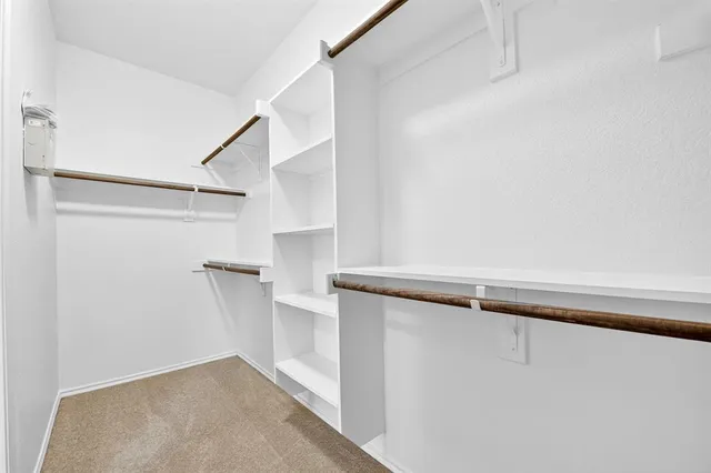 a view of a room with racks on the wall