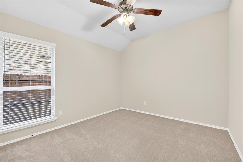 217 Rugby Lane McKinney, TX 75072 - Photo 35 of 40 a view of an empty room with a window