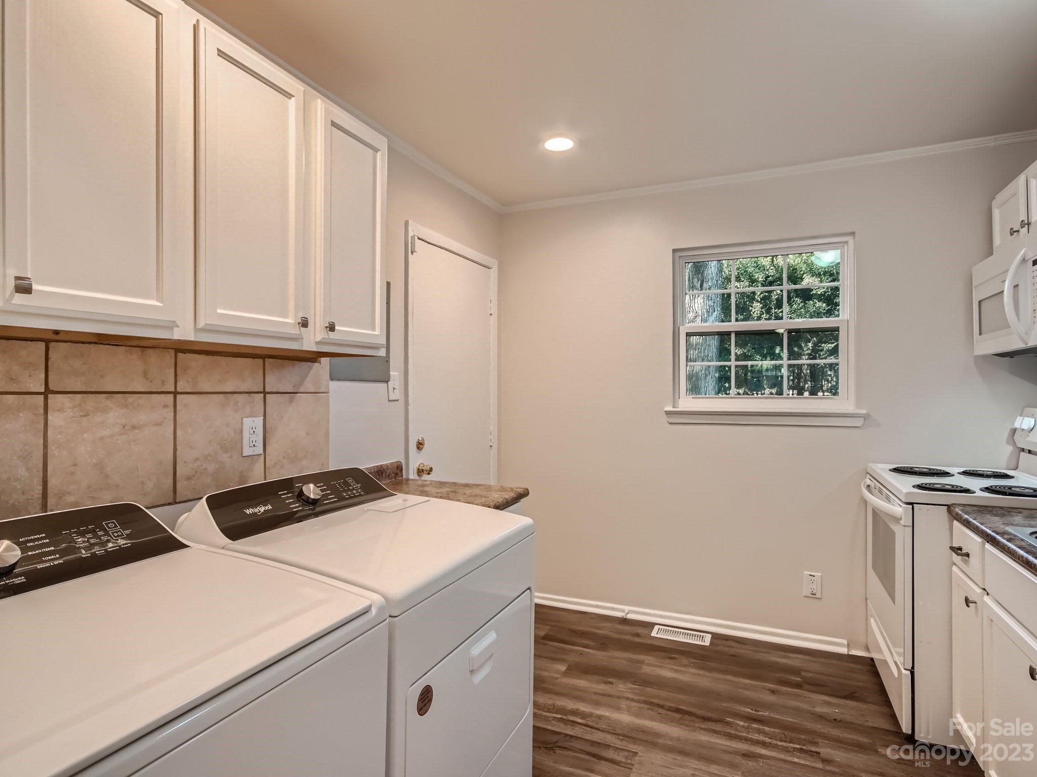 3219 Minnesota Road Charlotte, NC 28208 - Photo 4 of 11 a room with storage and utility