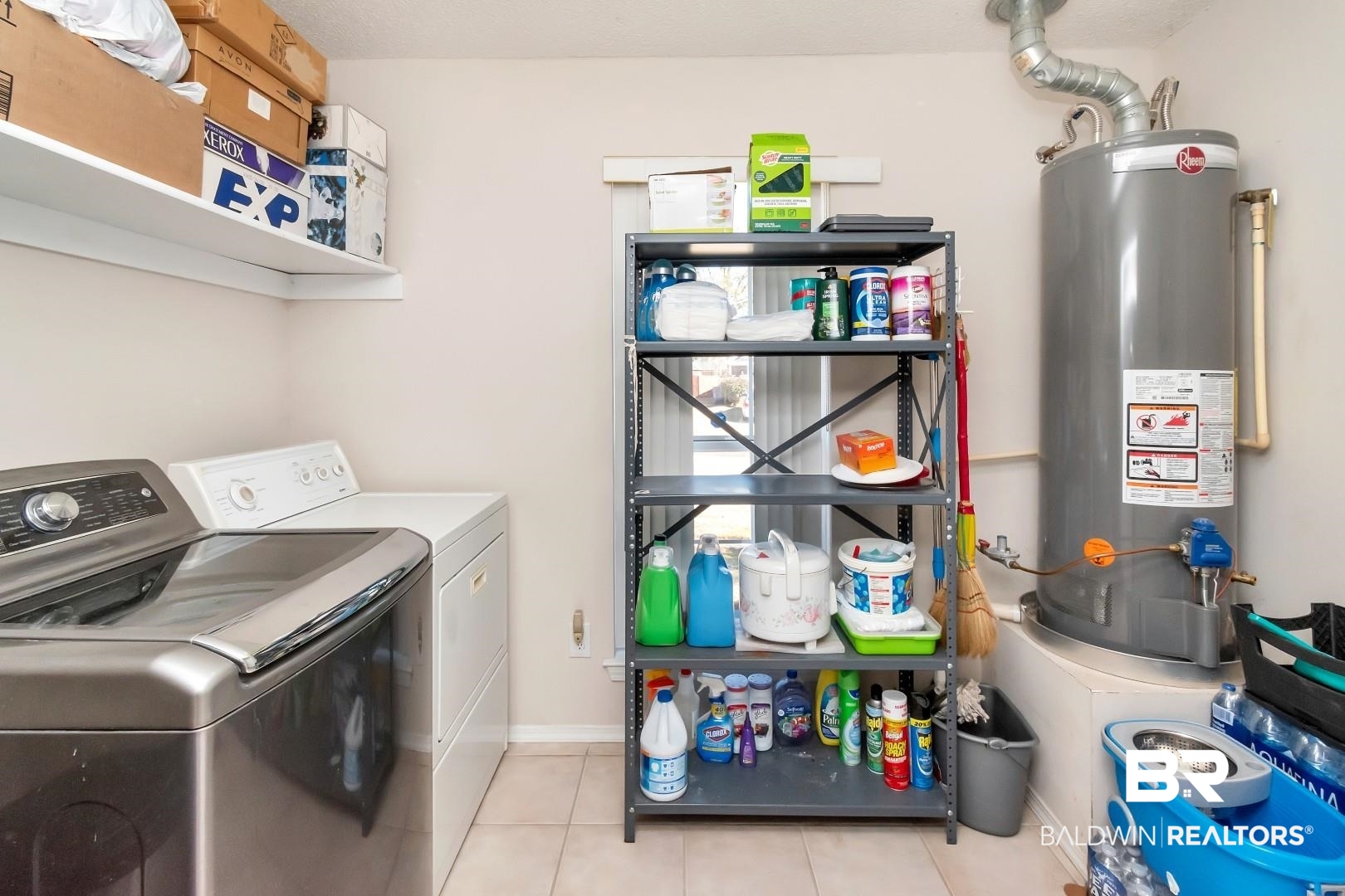 8221 Woodbend Drive Semmes, AL 36575 - Photo 26 of 35 Laundry area featuring water heater, light tile patterned floors, and washing machine and clothes dryer