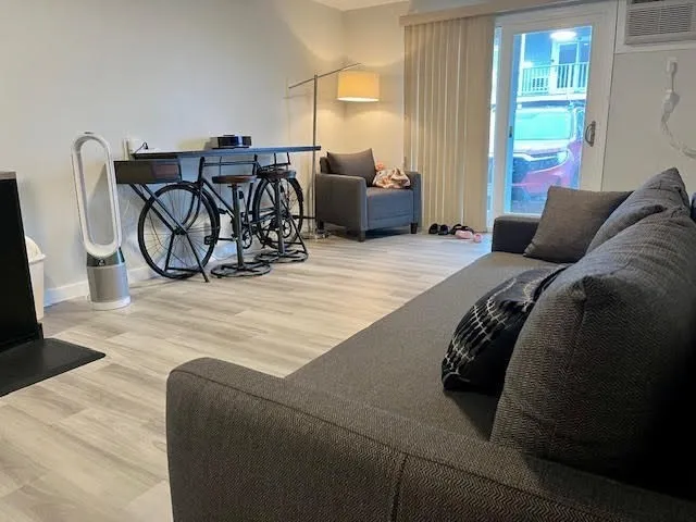 a bedroom with bed and a window