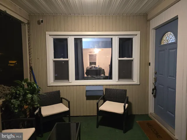 a room with furniture and a window