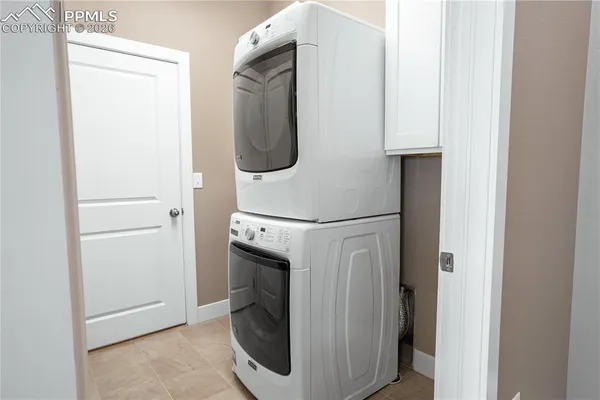 a view of a storage & utility room with washer and dryer