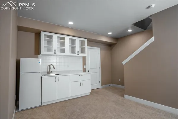 a view of cabinets and window