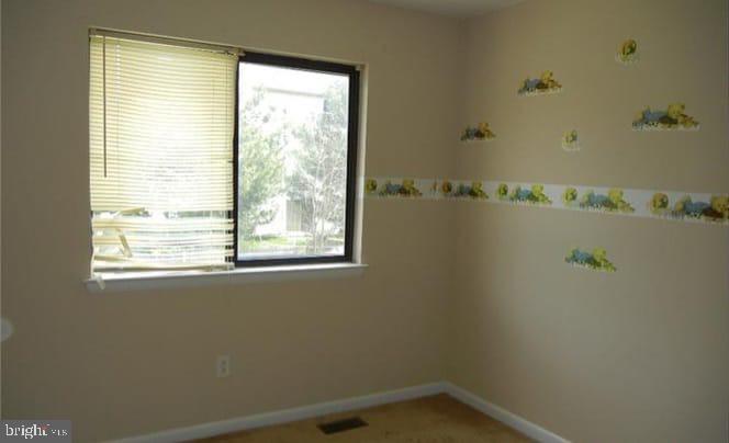 5 Liborio Lane New Castle, DE 19720 - Photo 13 of 18 a bathroom with a window and shower