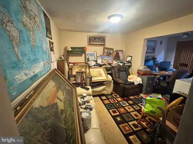 a picture of a living room with furniture