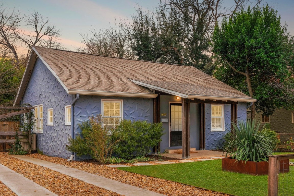4607 Avenue D Austin, TX 78751 - Photo 1 of 1 a view of a house with brick walls plants and large tree