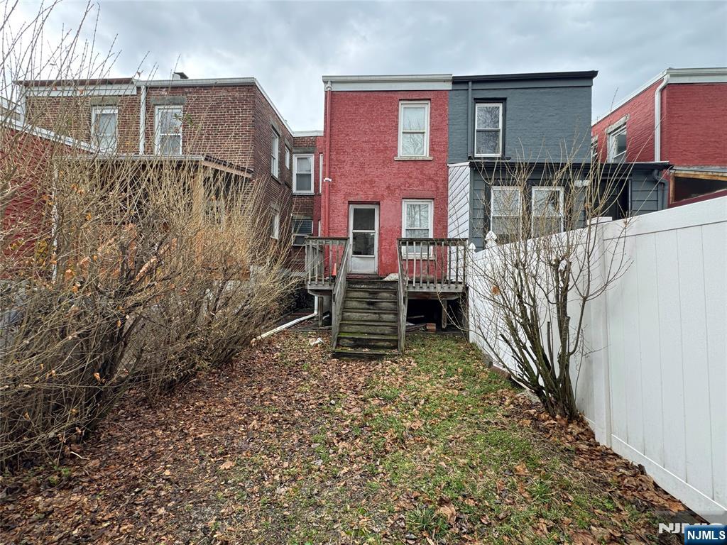 680 1/2 Chestnut Street Kearny, NJ 07032 - Photo 6 of 6 front view of a house with a yard