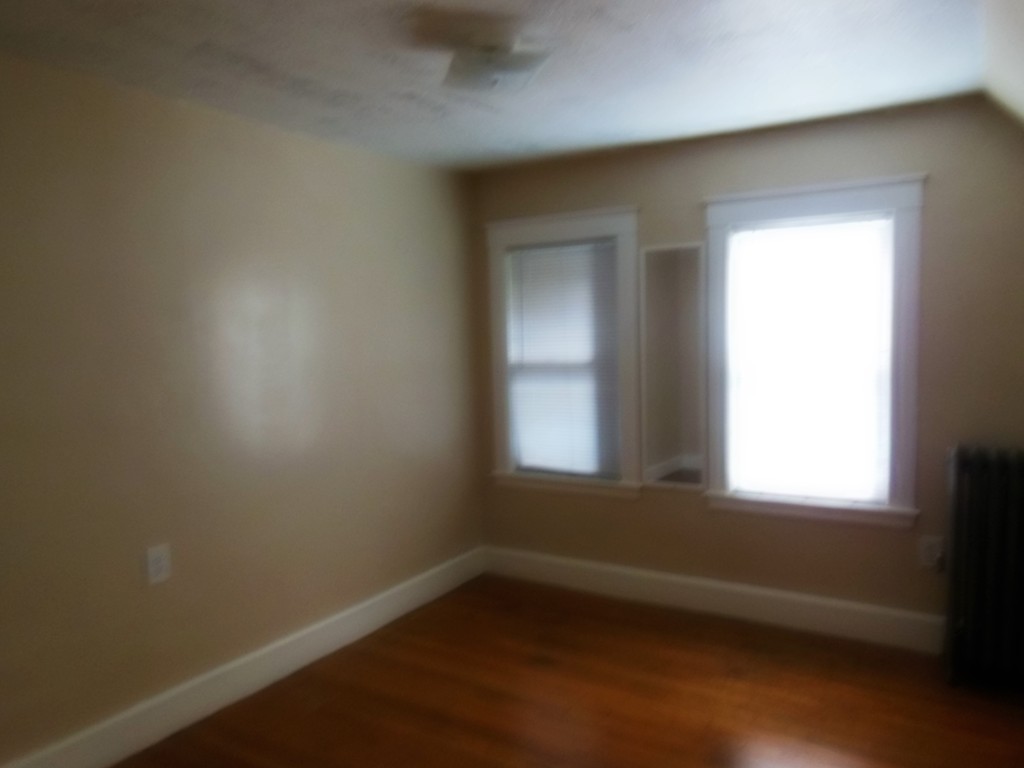 29 Chatham Road Everett, MA 02149 - Photo 14 of 14 an empty room with a window