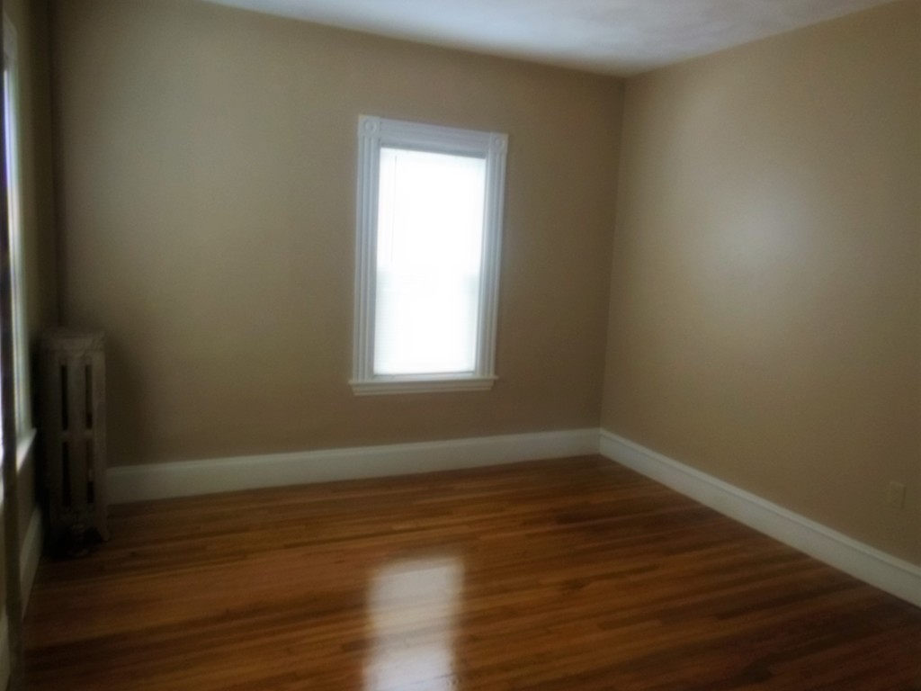 29 Chatham Road Everett, MA 02149 - Photo 8 of 14 wooden floor and window in an empty room