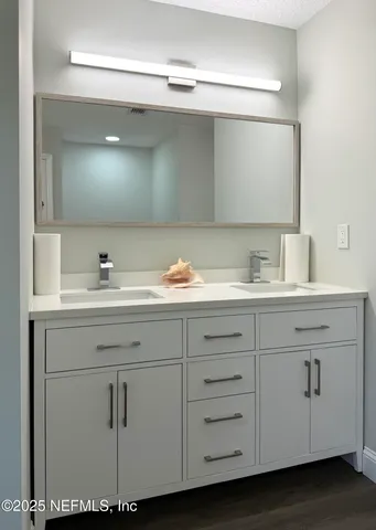 a front view of a house with swimming pool having outdoor seating