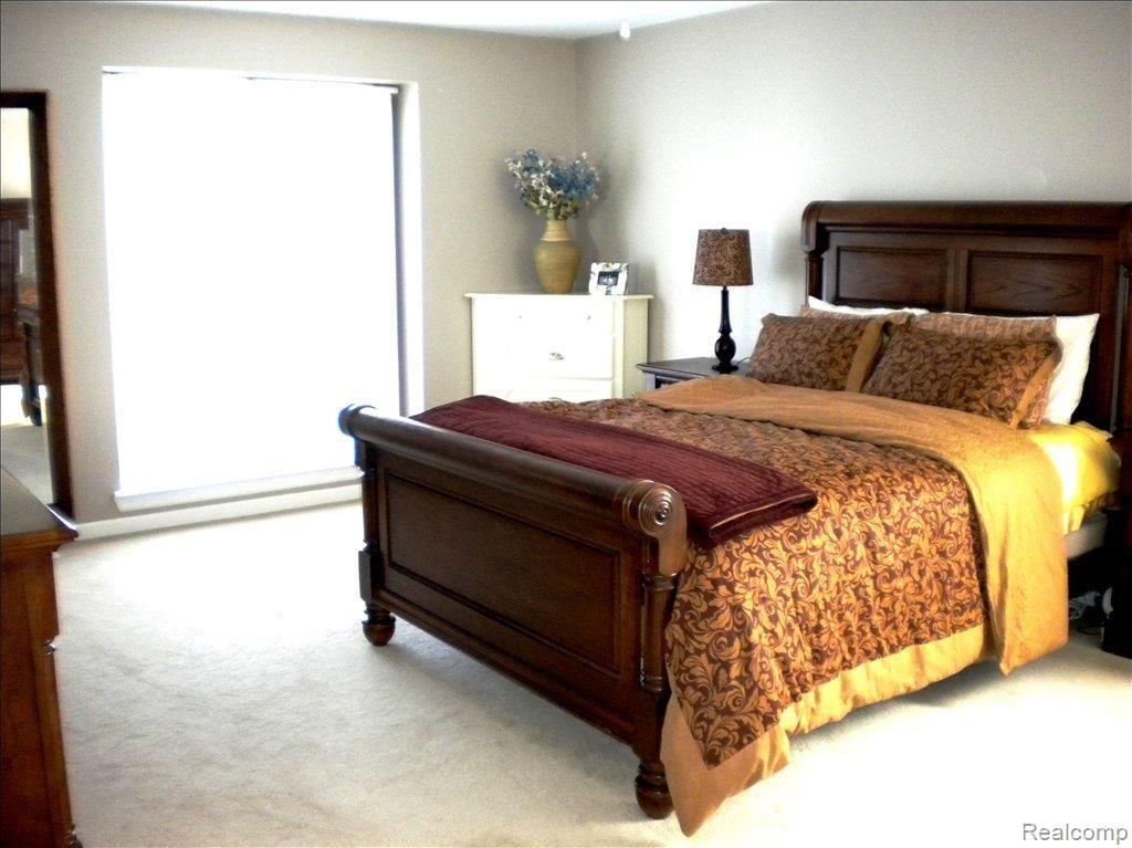 1795 Quincy Drive Rochester, MI 48306 - Photo 9 of 11 LARGE MASTER BEDROOM