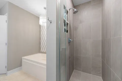 a bathroom with a shower and a toilet