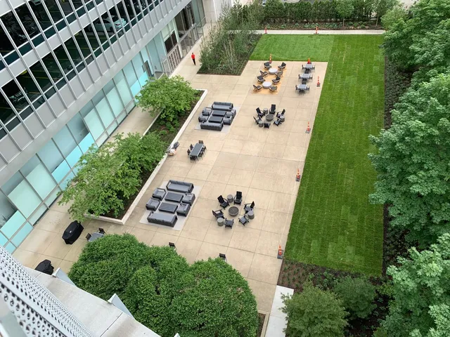 an aerial view of a house with outdoor space