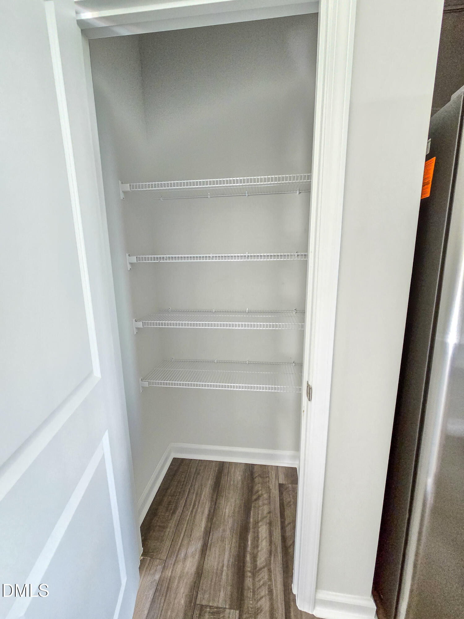 2431 Kasota Lane Raleigh, NC 27610 - Photo 20 of 46 a view of walk in closet with empty racks