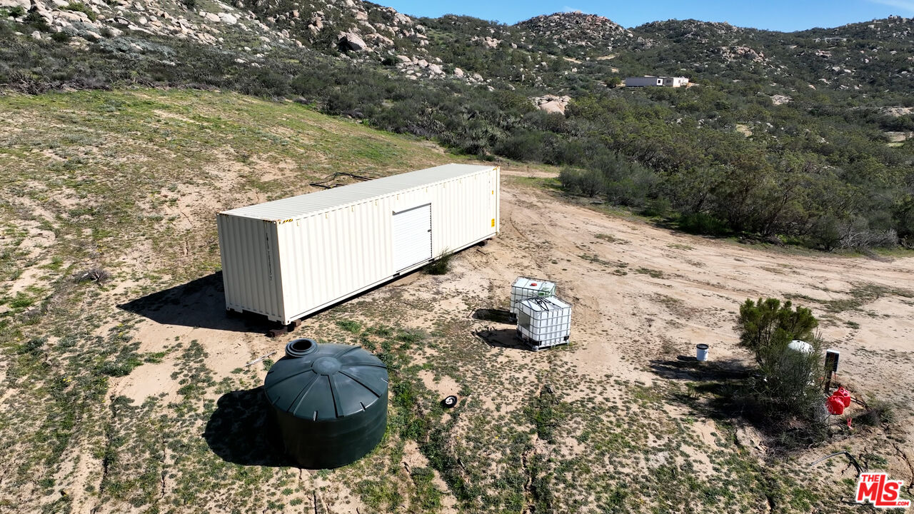 4 Sycamore Falls Road Aguanga, CA 92536 - Photo 14 of 67 a view of a backyard of the house